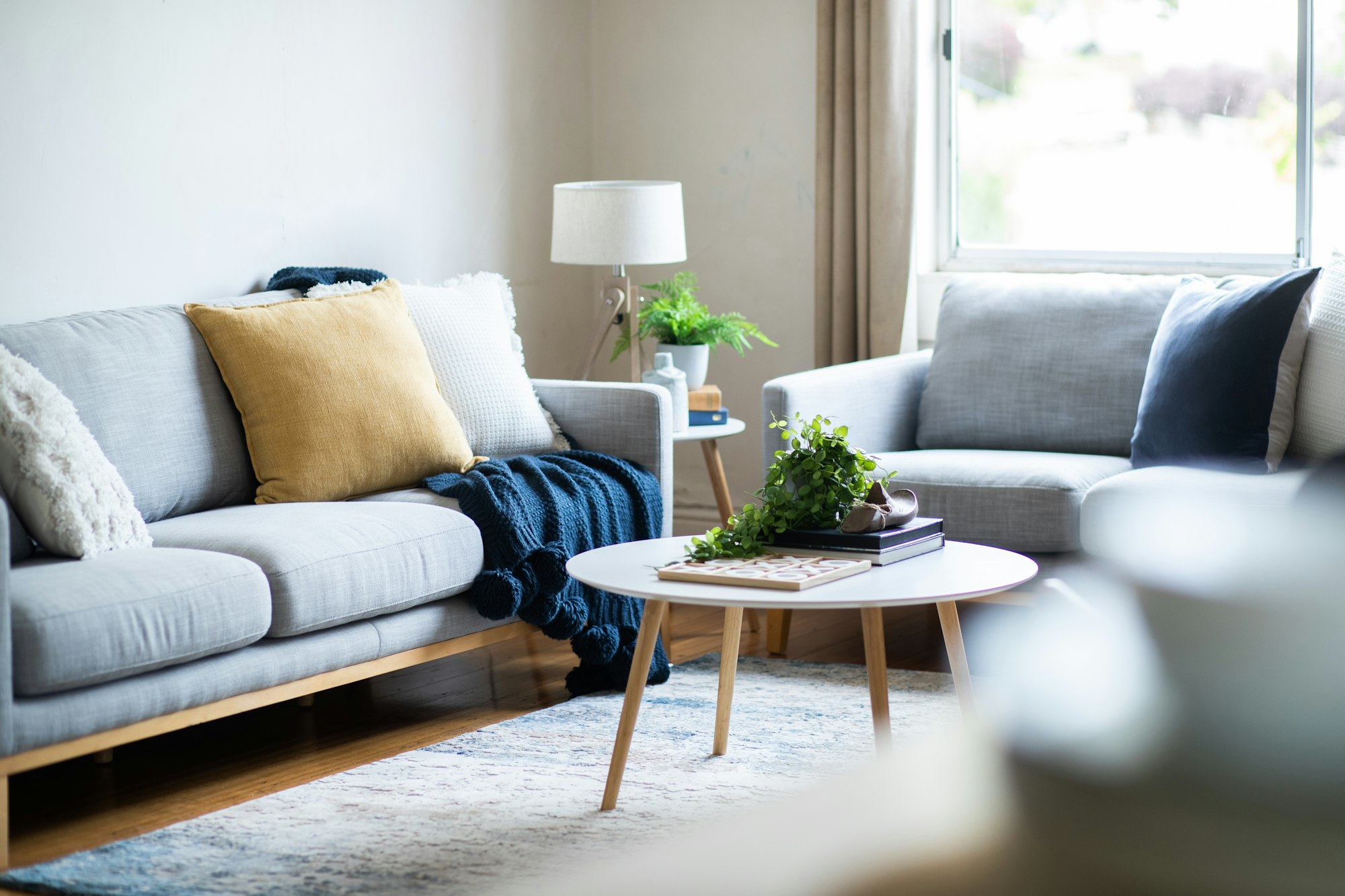 A calm living room with a sofa and coffee table